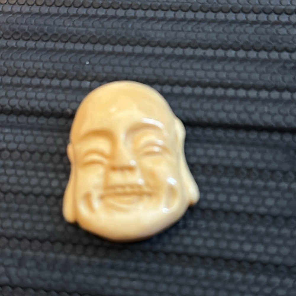Carved Buddha bead